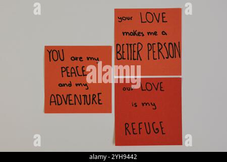 Notes with texts of Love and affection handwritten in colored post-it notes on a solid color background that allows for additional text to be added Stock Photo