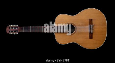 Classical vintage acoustic guitar isolated on black background Stock Photo