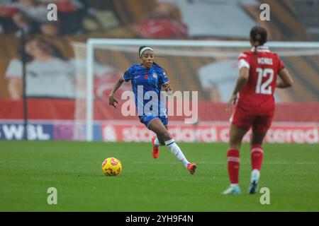 St Helens, UK. 10th Nov, 2024. St Helens, England, November 10th 2024 Ashley Lawrence (12 Chelsea) runs at the Liverpool defence. Liverpool v Chelsea, St Helens Stadium, WSL (Sean Walsh/SPP) Credit: SPP Sport Press Photo. /Alamy Live News Stock Photo