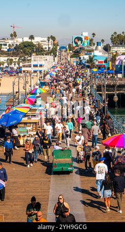 Santa Monica, USA. 9th November, 2024. High angle view of crowds of tourists enjoying unseasonably warm weather on Santa Monica Pier, Santa Monica, California, USA. Credit: Stu Gray/Alamy Live News. Stock Photo