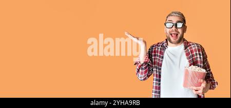 Funny man in glasses and popcorn ready to watch movie Stock Photo