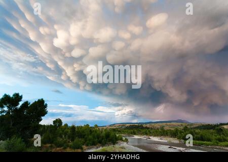 Lightning strikes from mammatus clouds above the Sleeping Indian in Grand Teton National Park, Wyoming. Stock Photo