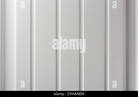 white color plastic panel surface with pattern of vertical lines texture background, abstract backdrop for graphic designing Stock Photo