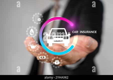 Digital composite of Man holding car icon.Car automobile insurance and car services concept. Businessman with offering gesture and icon of car, protec Stock Photo