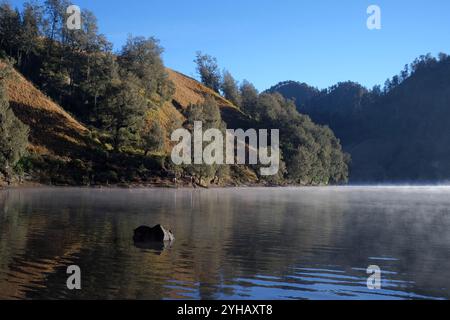 Morning atmosphere in Ranu Kumbolo, a freshwater lake located at an ...