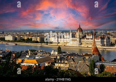 Sunset view of Budapest, highlighting the historic Parliament, Danube River, and iconic landmarks like Buda Castle and Chain Bridge. Perfect showcase Stock Photo