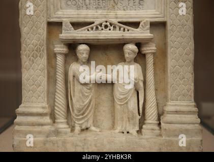 Roman urn with a dextrarum iunctio scene (act of shaking hands). Rome, Via Appia. 2nd century. Detail. National Roman Museum. Rome. Italy. Stock Photo