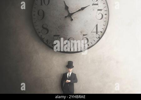elegant businessman checks the time on his wristwatch, time concept Stock Photo