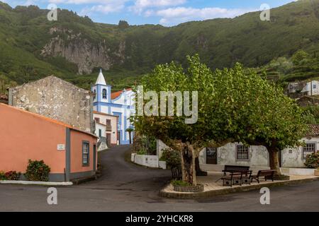 The central square of Fajãzinha on Flores Island, Azores, with the Church of Nossa Senhora dos Remédios. Stock Photo