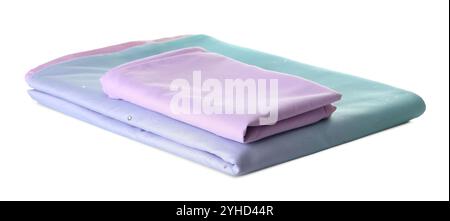 Stack of clean bed sheets isolated on white Stock Photo