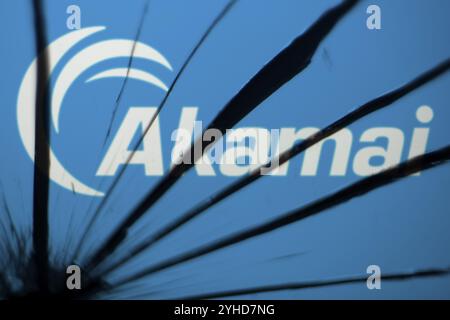 Dhaka, Bangladesh- 09 Nov 2024: Akamai logo is visible on the broken glass Stock Photo