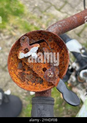 Mechanism of a rusty bicycle bell Stock Photo