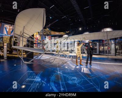 [Army and Society Gallery] FORT BELVOIR, Virginia — The Wright Army Flyer exhibit in the Army and Society Gallery at the National Museum of the United States Army showcases the aircraft that launched military aviation. This aircraft represents the Wright brothers' Model A Military Flyer, which became Signal Corps Airplane No. 1 in 1909. The exhibit demonstrates the beginning of the Army's air power and its impact on military operations. Stock Photo