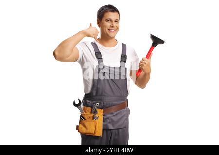 Man from a plumbing service holding a plunger isolated on white background Stock Photo