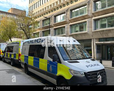 London, UK. 11th Nov, 2024. Police cars parked in front of the British Ministry of Justice. Credit: Benedikt von Imhoff/dpa/Alamy Live News Stock Photo