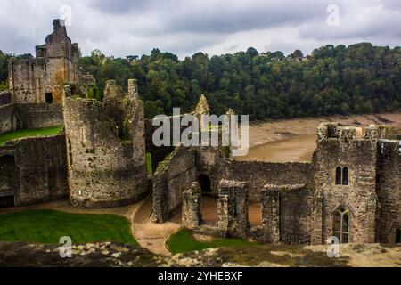 Looking out over the impressive ruins of Chepstow Castle, on the bank of the river Wye, in Wales,  as seen from one of the remaining towers, Stock Photo