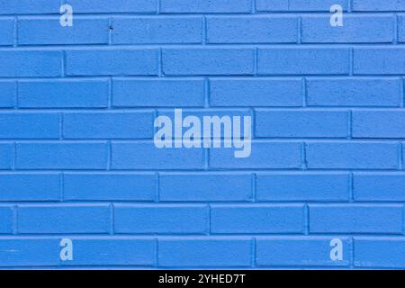 Background from a wall made of blue painted bricks Stock Photo