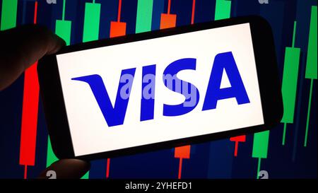 Konskie, Poland - November 10, 2024: Visa company logo displayed on mobile phone Stock Photo