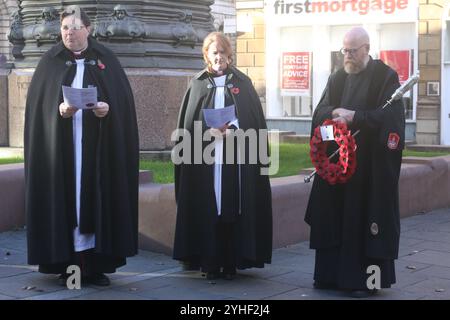 Armistice Day, Newcastle Cathedral, St Nicholas Square, People gather for the anniversary of the Armistice signing with the Reverend Canon Lee Batson,The Dean of Newcastle who lead a short act of remembrance, followed by the laying of poppies, Newcastle upon Tyne, UK, November 11th, 2024, Credit: DEW/Alamy Live News Stock Photo