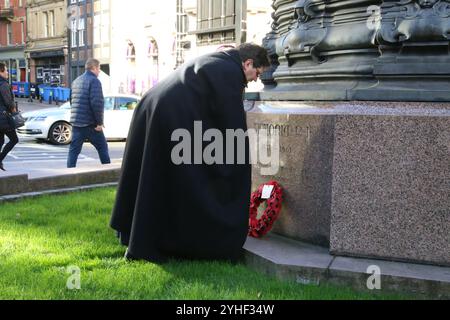 Armistice Day, Newcastle Cathedral, St Nicholas Square, People gather for the anniversary of the Armistice signing with the Reverend Canon Lee Batson,The Dean of Newcastle who lead a short act of remembrance, followed by the laying of poppies, Newcastle upon Tyne, UK, November 11th, 2024, Credit: DEW/Alamy Live News Stock Photo