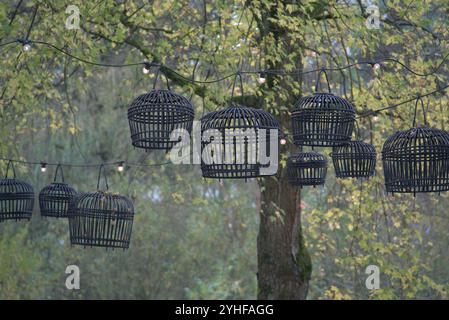 Elegant Black Wooden Lamps for an Ephemeral Wedding Style Stock Photo