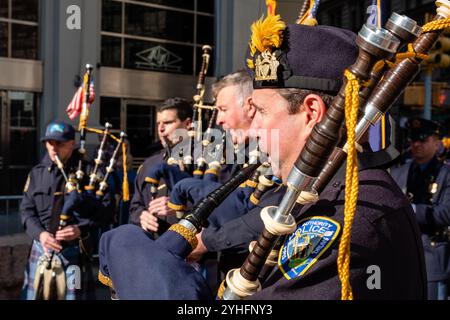 New York City, NY, USA. 11th Nov, 2024. The annual Veterans Day Parade gathered American veterans, foreign veterans, and their supporters to march up Fifth Avenue. Pipers from the Port Authority of New York's Pipes and Drums. Credit: Ed Lefkowicz/Alamy Live News Stock Photo