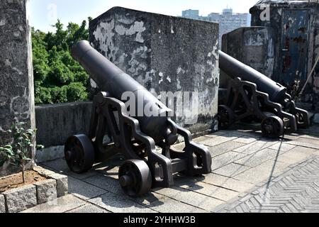 Two cannons on the wall of Fortaleza do Monte in Macau Stock Photo