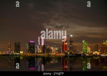 Beautiful Lusail Skyline at night from Beach 974 Doha Qatar Stock Photo