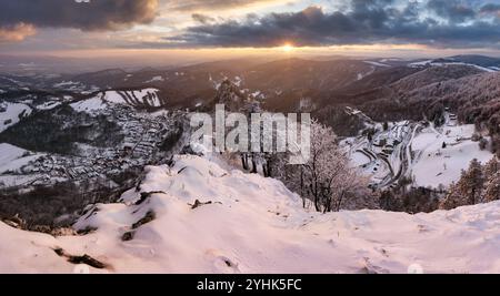 Panoramic view of beautiful winter wonderland scenery in scenic golden evening light at sunset with clouds in Scandinavia, northern Europe Stock Photo
