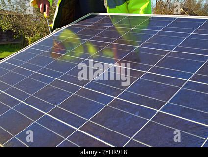 Installing solar panel Stock Photo