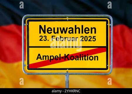 Neuwahlen am 23. Februar 2025 nach der Ampel-Koalition Ein Ortsschild steht vor der Deutschlandfahne mit dem durchgestrichenen Aufdruck Ampel-Koalitio Stock Photo