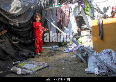 Middle East news.War Gaza Palestinians inspect the damage following Israeli bombardment which hit a camp for displaced people from other parts of northern Gaza inside the Al-Jazira Sports Club in Gaza City on November 12, 2024. The Gaza Strip Palestine Copyright: xMahmoudxIssax IMG 2297 Stock Photo