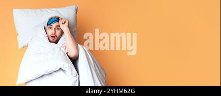 Funny guy woke up on yellow background Stock Photo