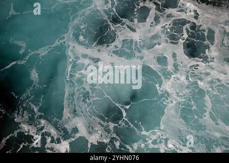 Turbulent water created by a ship at sea. Stock Photo