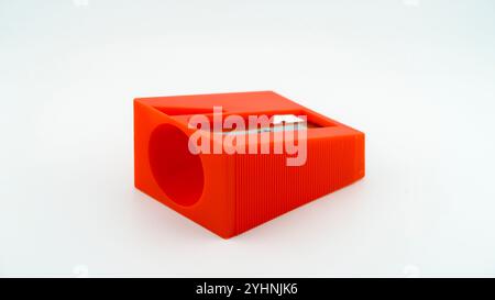 Carrot peeler in style of large pencil sharpener on white background Stock Photo