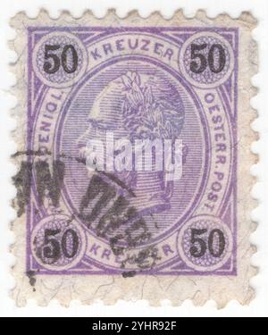 AUSTRIA — 1890 September 01: 50 kreuzer violet postage stamp depicting Embossed portrait of Austrian Monarch Emperor Franz Josef. Franz Joseph I or Francis Joseph I was Emperor of Austria, King of Hungary, and the other states of the Habsburg monarchy from 2 December 1848 until his death on 21 November 1916. In the early part of his reign, his realms and territories were referred to as the Austrian Empire, but were reconstituted as the dual monarchy of the Austro-Hungarian Empire in 1867. From 1 May 1850 to 24 August 1866, Franz Joseph was also President of the German Confederation Stock Photo