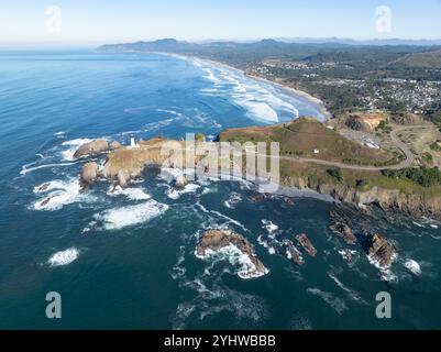 The Yaquina Head Lighthouse stands along the scenic and rugged coastline of Newport, Oregon. This beautiful 93 foot tall lighthouse was built in 1872. Stock Photo