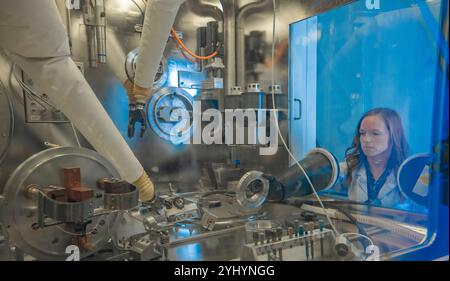 Chemist Renata Martins working in radiation protection at CERN (European Organization for Nuclear Research). The group ensures that personnel on the CERN sites and the public are protected from potentially harmful effects of ionising radiation linked to CERN activities. Lambert is also Lead Operator for the Nuclear Medicine facility, MEDICIS. Stock Photo