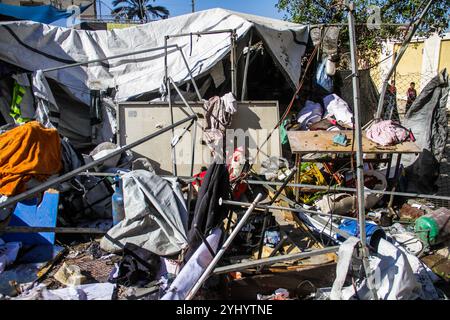 Gaza City, Palestine. 12th Nov, 2024. Palestinians inspect the damage following Israeli bombardment which hit a camp for displaced people from other parts of northern Gaza inside the Al-Jazira Sports Club in Gaza City. (Photo by Mahmoud Issa/SOPA Images/Sipa USA) Credit: Sipa USA/Alamy Live News Stock Photo