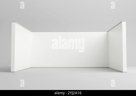 A simple white exhibition booth setup with three walls, creating a clean and blank canvas. Perfect for customizable branding displays at trade shows o Stock Photo