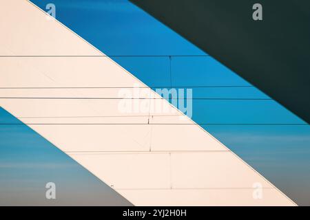 Abstract background, metal construction and wires against blue sky, selective focus Stock Photo