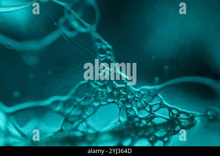 Silver liquid connections, bubble in macro, movement of liquid in a bubble, abstract background Stock Photo