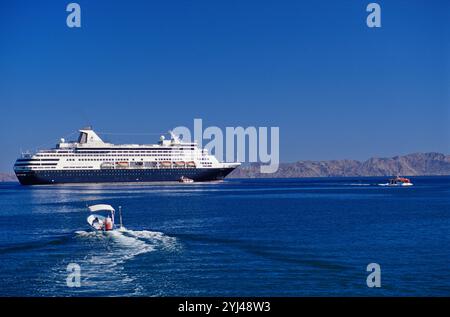 MS Ryndam, Holland America Line cruise ship moored offshore town of Loreto, Gulf of California (Sea of Cortez), Baja California Sur, Mexico Stock Photo