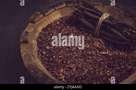 Madder dye, Endro, rhizome for coloring eggs, powder from the roots of endro with onion husks, in a wooden plate, top view, Easter, Georgia, Asia Stock Photo
