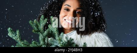 An elegant woman enjoys a winter wonderland, wearing a chic ski suit and cozy faux fur jacket. Stock Photo
