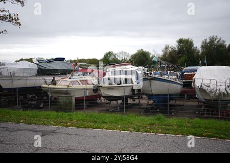 Hamburg, Germany. 14th Oct, 2024. Motorboats are docked at a boathouse on the Dove-Elbe. Credit: Marcus Brandt/dpa/Alamy Live News Stock Photo