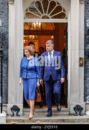 London, UK. 13th Nov, 2024. Marcel Ciolacu, Prime Minister of Romania, exits to 10 Downing Street in Westminster with Ambassador Laura Popescu, Romanian Ambassador to the UK, after meeting the Prime Minister, Sir Keir Starmer. Ciolacu is on a working visit to the UK and will also attend the Romania-Great Britain Economic Forum. Credit: Imageplotter/Alamy Live News Stock Photo