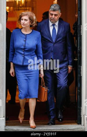 London, UK. 13th Nov, 2024. Marcel Ciolacu, Prime Minister of Romania, exits to 10 Downing Street in Westminster with Ambassador Laura Popescu, Romanian Ambassador to the UK, after meeting the Prime Minister, Sir Keir Starmer. Ciolacu is on a working visit to the UK and will also attend the Romania-Great Britain Economic Forum. Credit: Imageplotter/Alamy Live News Stock Photo