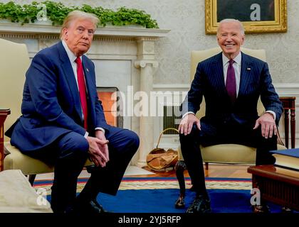 United States President Joe Biden, right, and US President-elect Donald Trump during a meeting in the Oval Office of the White House in Washington, DC, US, on Wednesday, November 13, 2024. Biden will argue in favor of continued US aid to Ukraine during the transition to President-elect Donald Trump's administration, according to national security advisor Jake Sullivan. Credit: Al Drago/Pool via CNP /MediaPunch Stock Photo