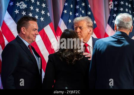 Washington, Vereinigte Staaten. 13th Nov, 2024. United States President-elect Donald Trump greets US Representative Elise Stefanik (Republican of New York), who has been nominated by Trump to serve as the US ambassador to the United Nations, as he arrives for a meeting with US House Republicans at the Hyatt Regency hotel in Washington, DC on November 13, 2024. Credit: Allison Robbert/Pool via CNP/dpa/Alamy Live News Stock Photo